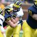 Michigan fullback Joe Kerridge and defensive end Matthew Godin during spring practice at Michigan Stadium on Saturday, April 13, 2013. Melanie Maxwell I AnnArbor.com